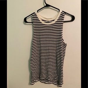 A white and dark blue strip top